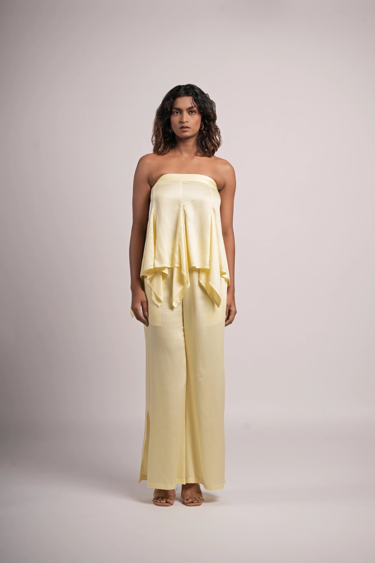 Butter yellow satin co-ord set styled for resort evening — strapless tube top and wide-leg pants — Label WildChild