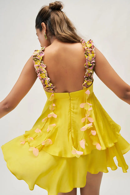 Back view of yellow satin mini dress with zipper closure and petal accents — handmade India Label WildChild